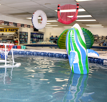 Chemical and water care products neatly organized on retail shelving